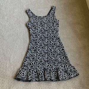 Gently worn xs black/white ruffled hem dress